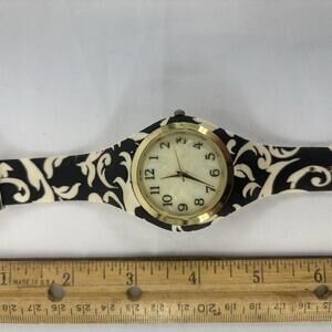 accutime watch corp white And Black Mod rubber band with White face Gold trim